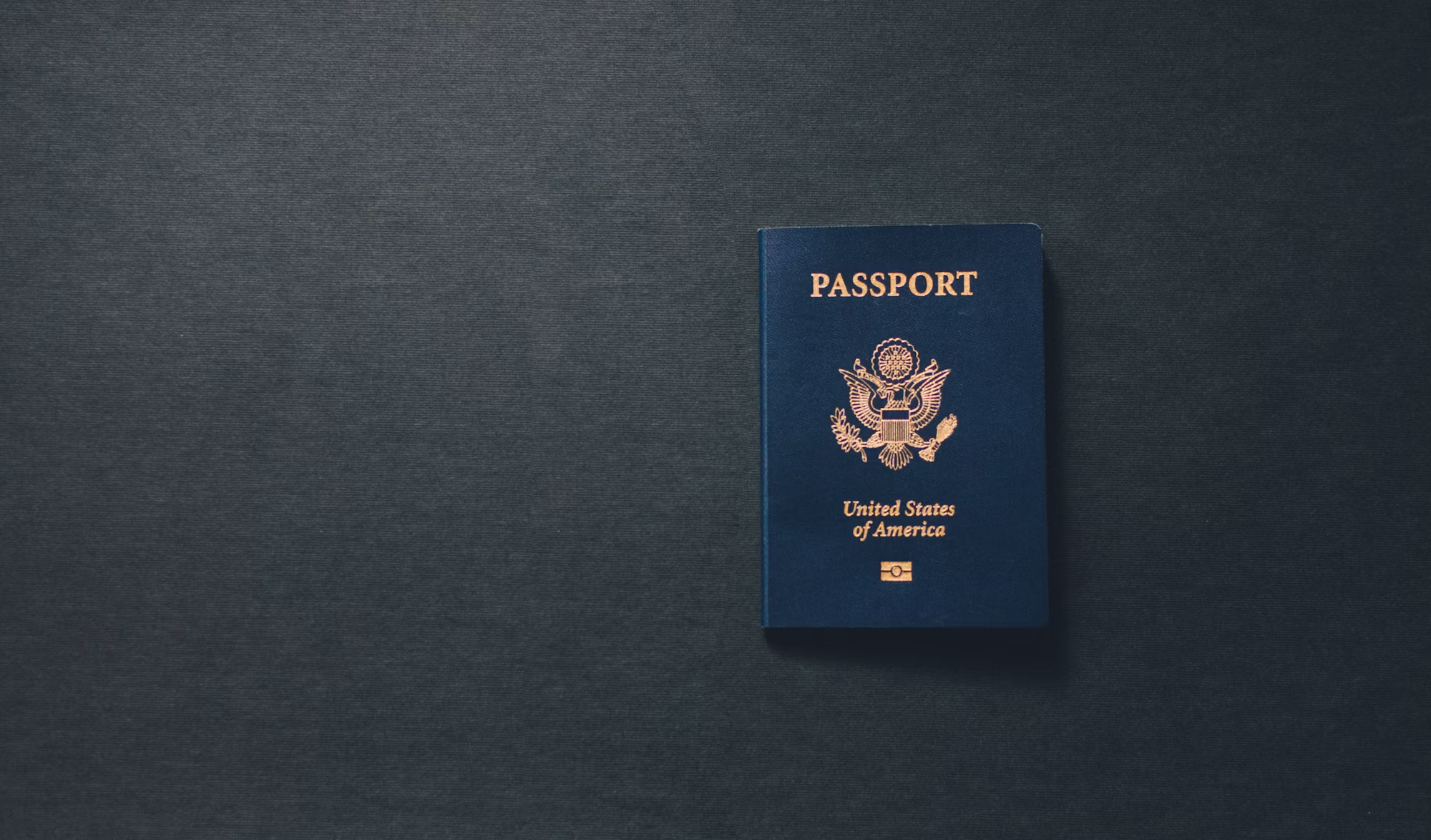 An open passport on a desk